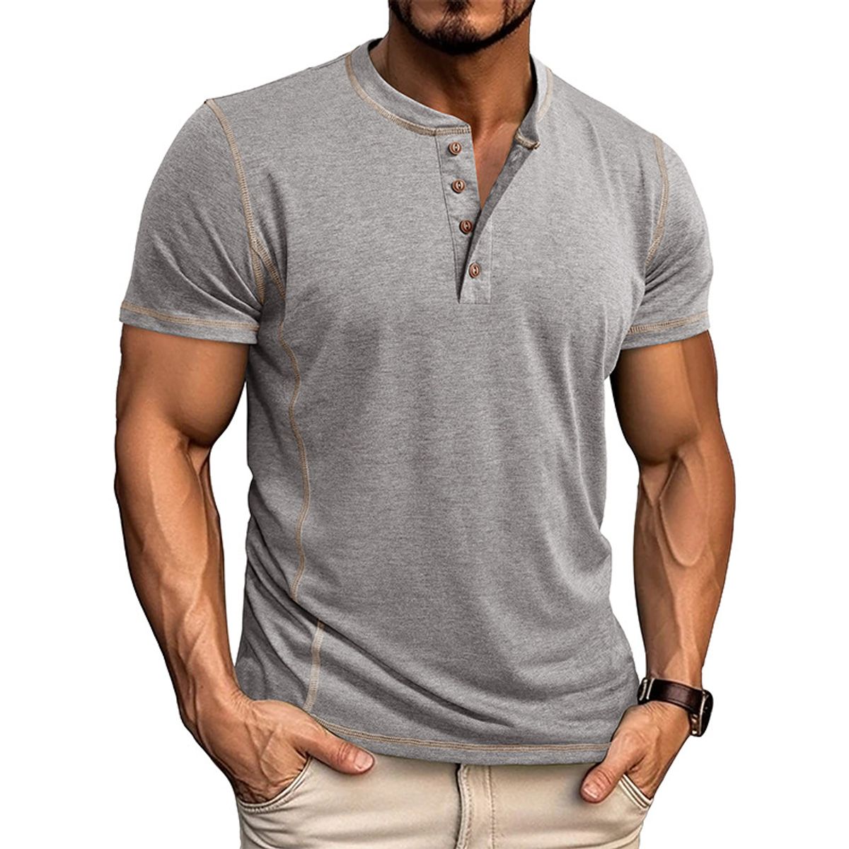 Man wearing a gray henley shirt with beige buttons on a white background