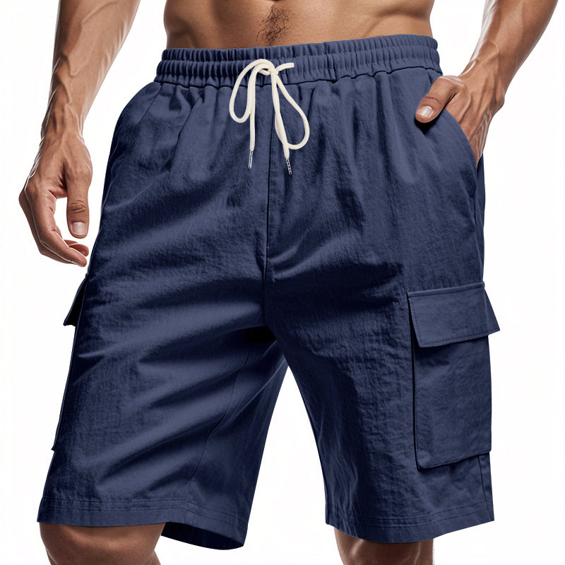 Navy blue cargo shorts with a drawstring on a white background