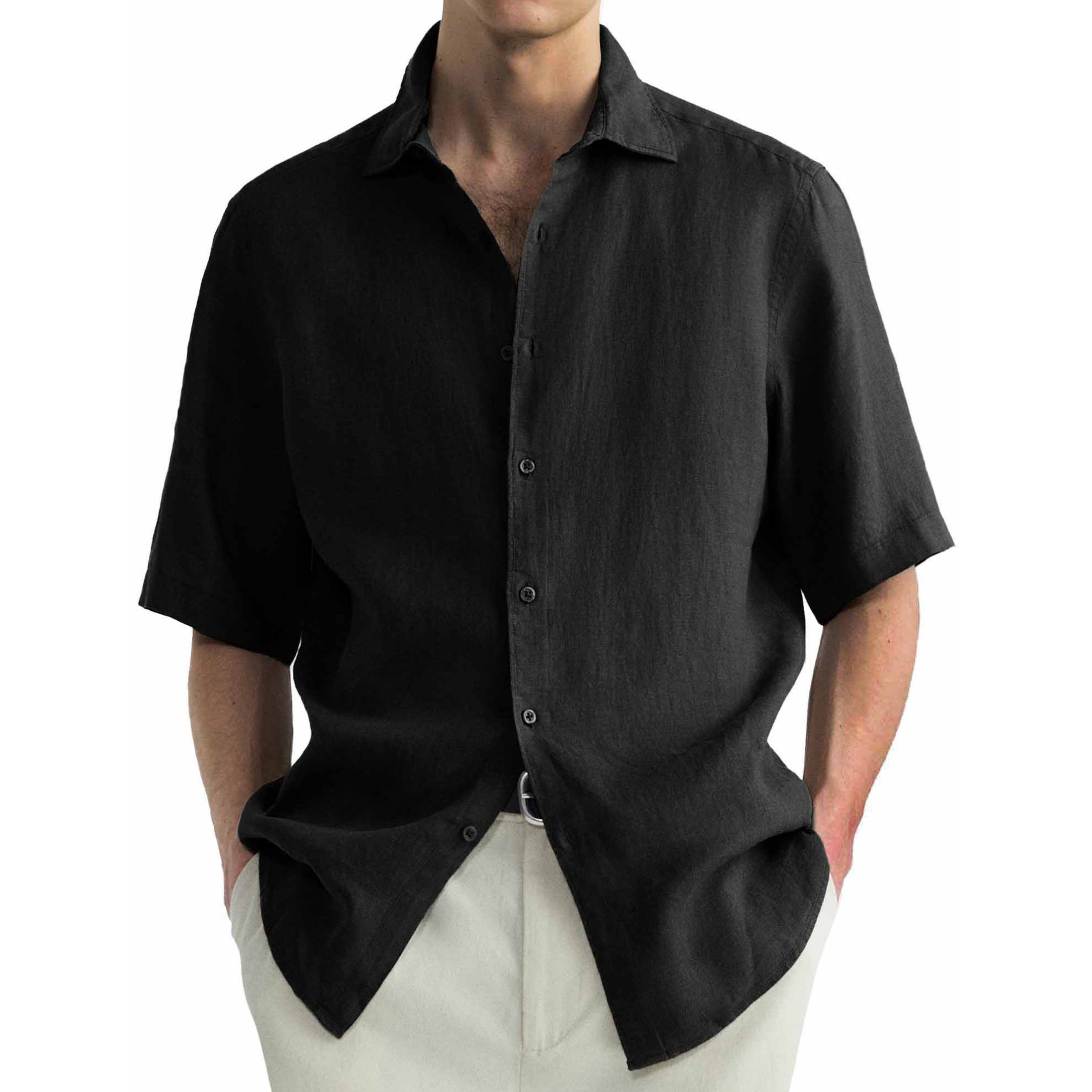 Black short-sleeve shirt worn by a person on a white background