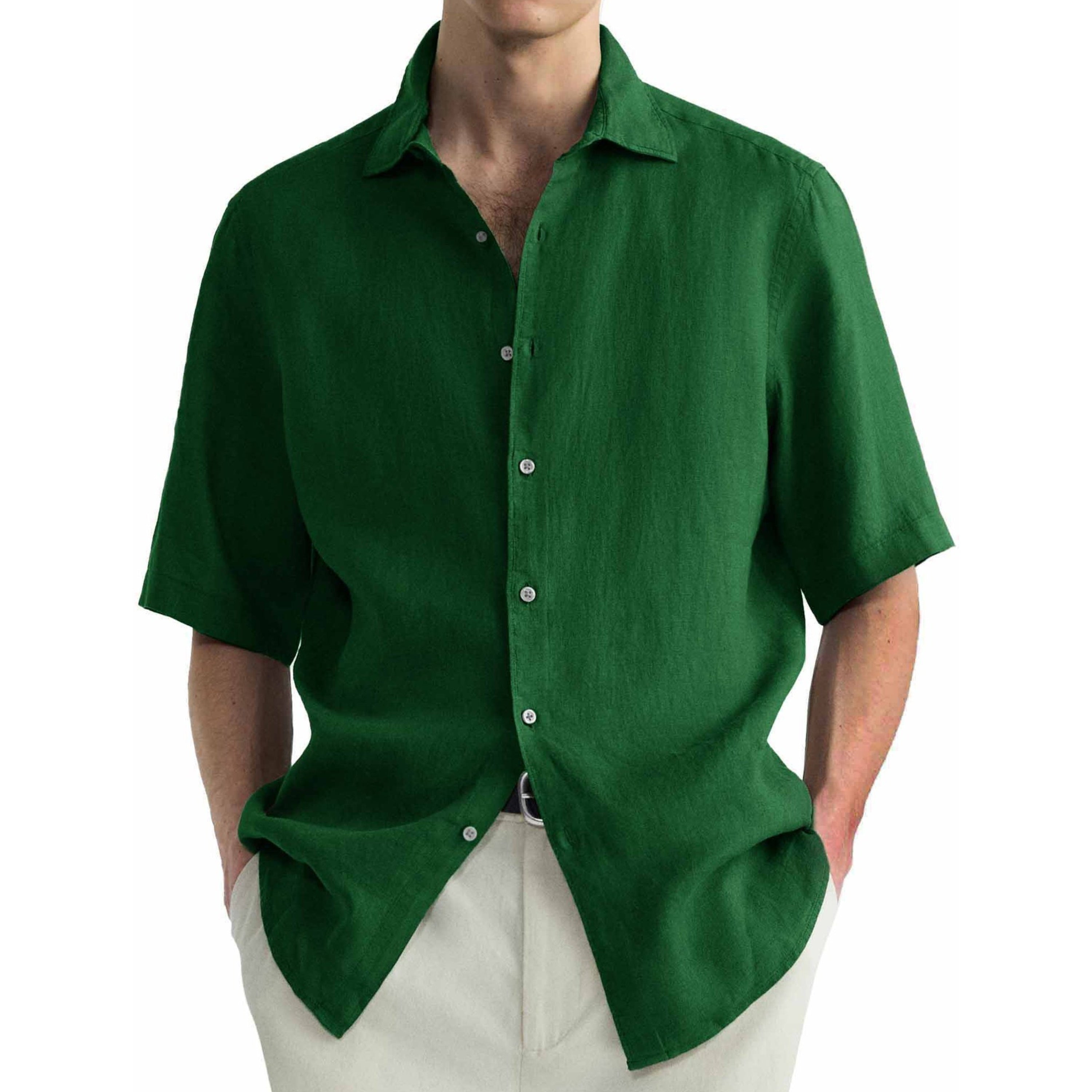 Green short-sleeve shirt worn by a person on a white background