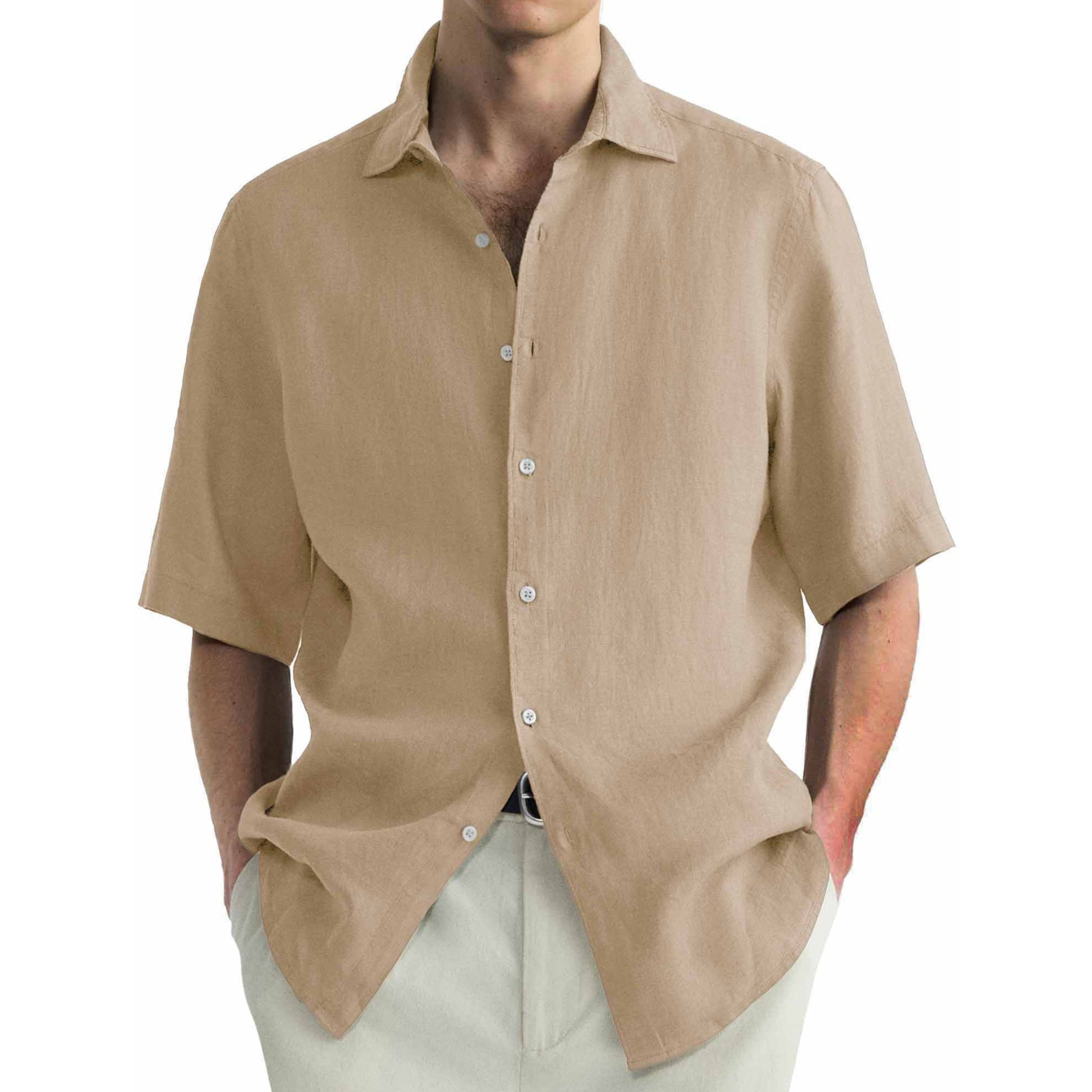 Beige short-sleeve shirt worn by a person on a plain background