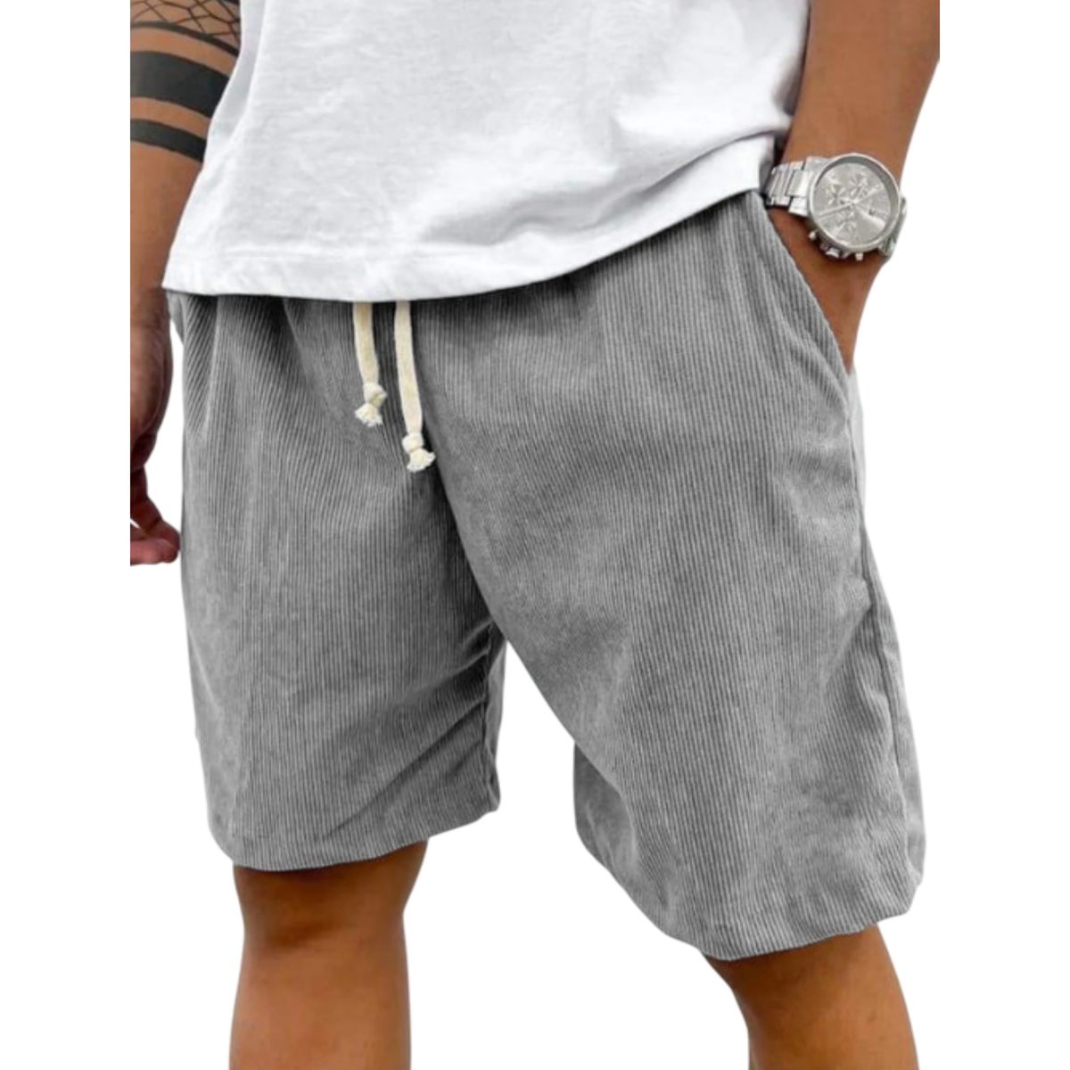 Person wearing gray shorts with a white shirt on a white background