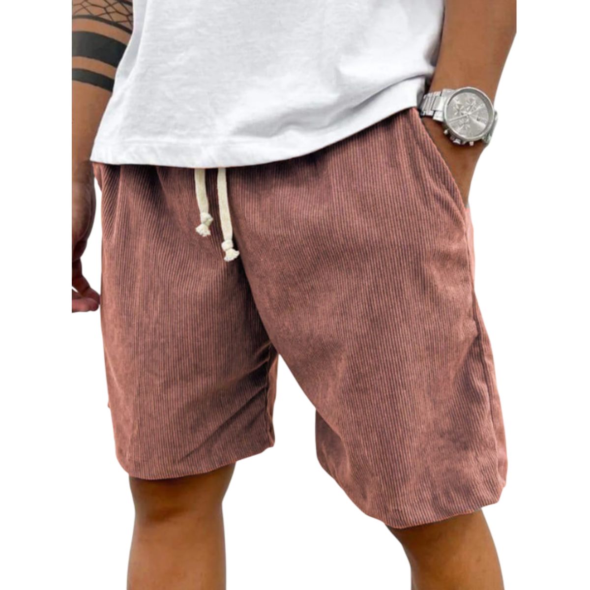 Brown corduroy shorts worn by a person on a white background