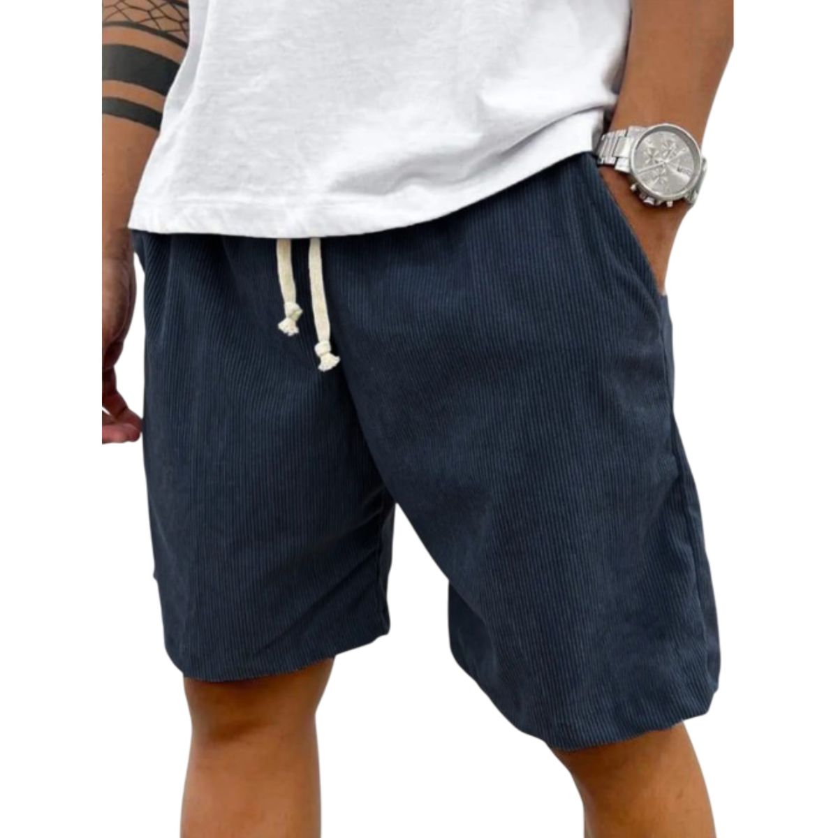 Person wearing navy shorts with a white drawstring, white shirt, and silver watch on a white background
