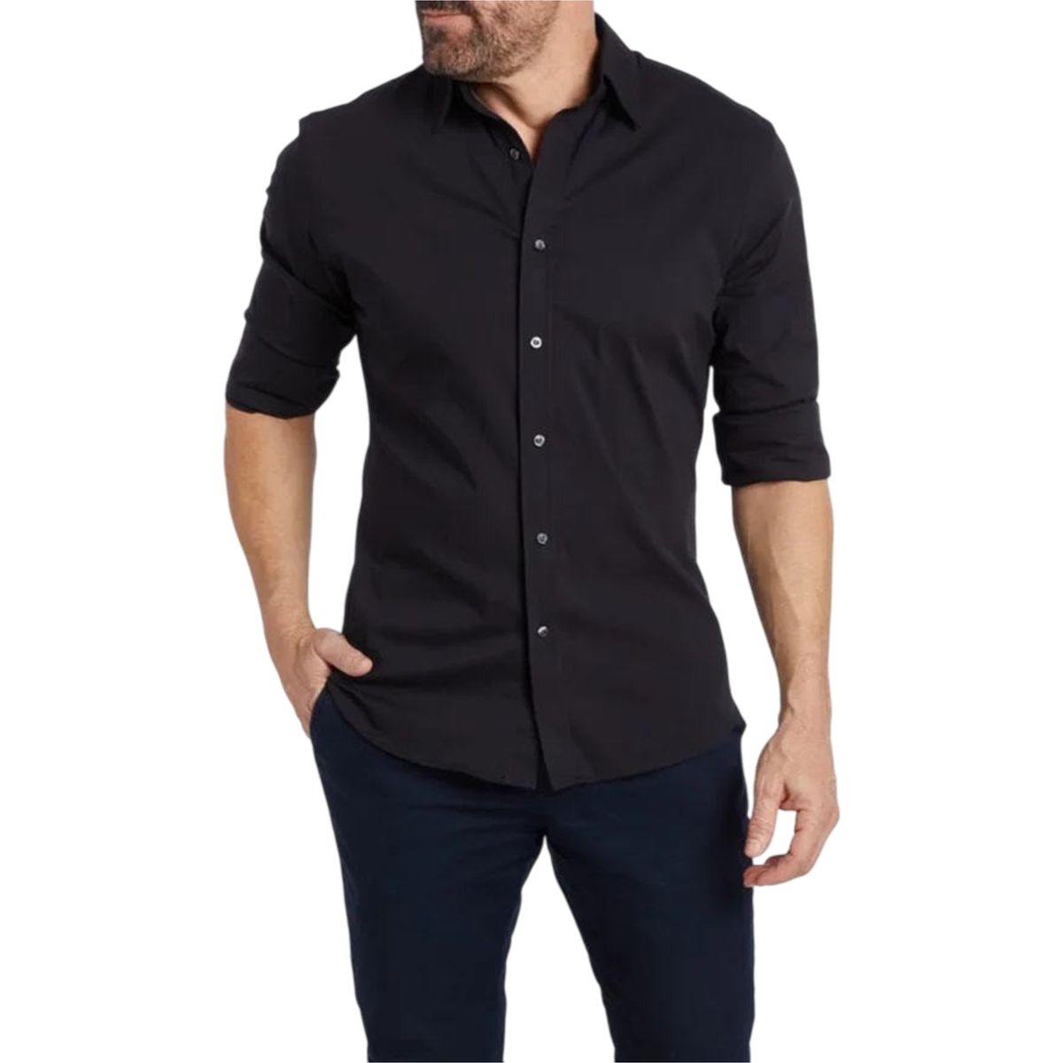 Man wearing a black button-up shirt and dark pants on a white background