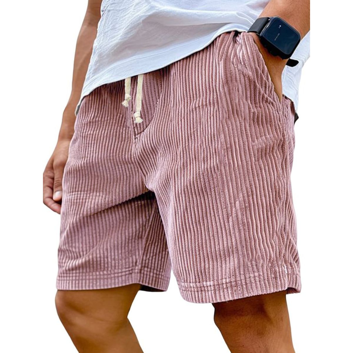 Person wearing pink striped shorts on a white background