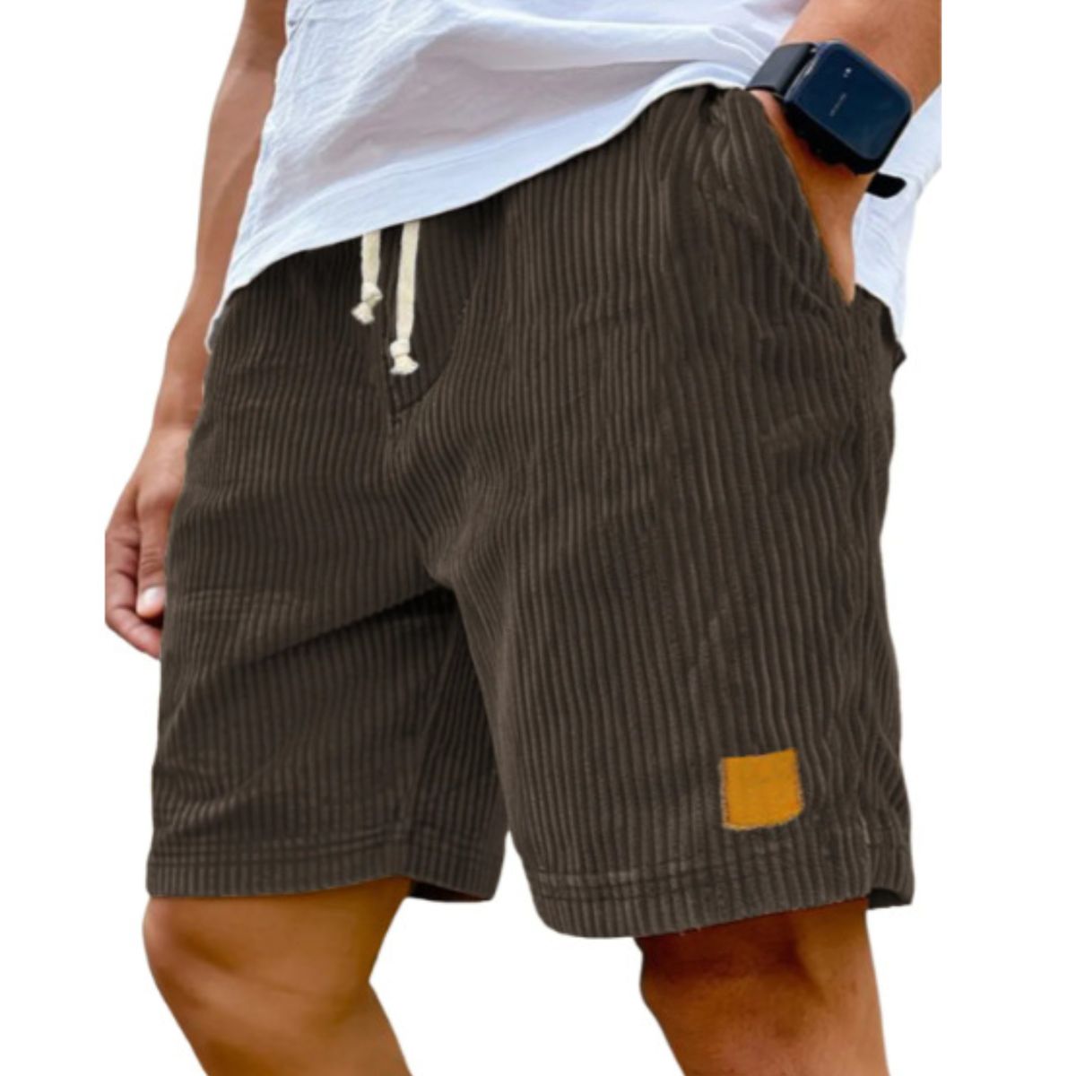 Brown corduroy shorts worn by a person on a white background