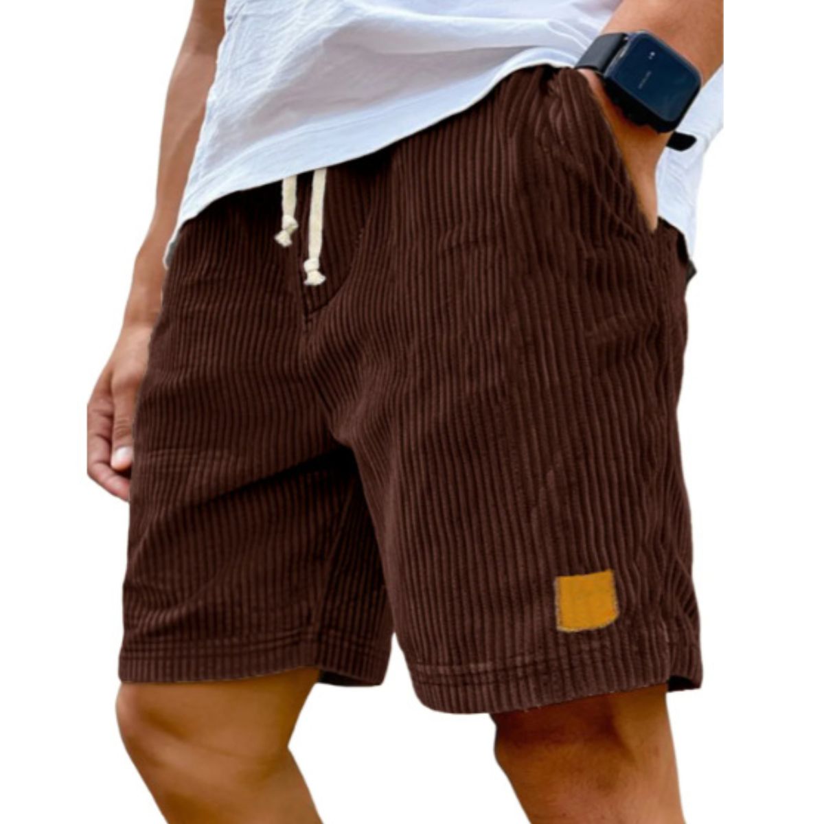 Brown corduroy shorts worn by a person on a white background