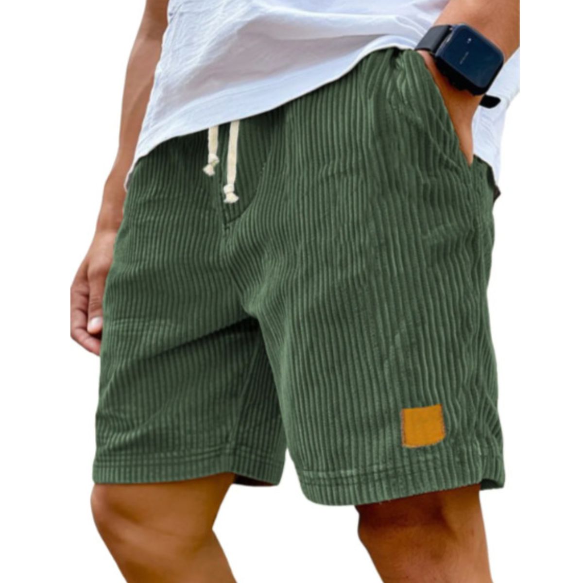 Green striped shorts worn by a person on a white background