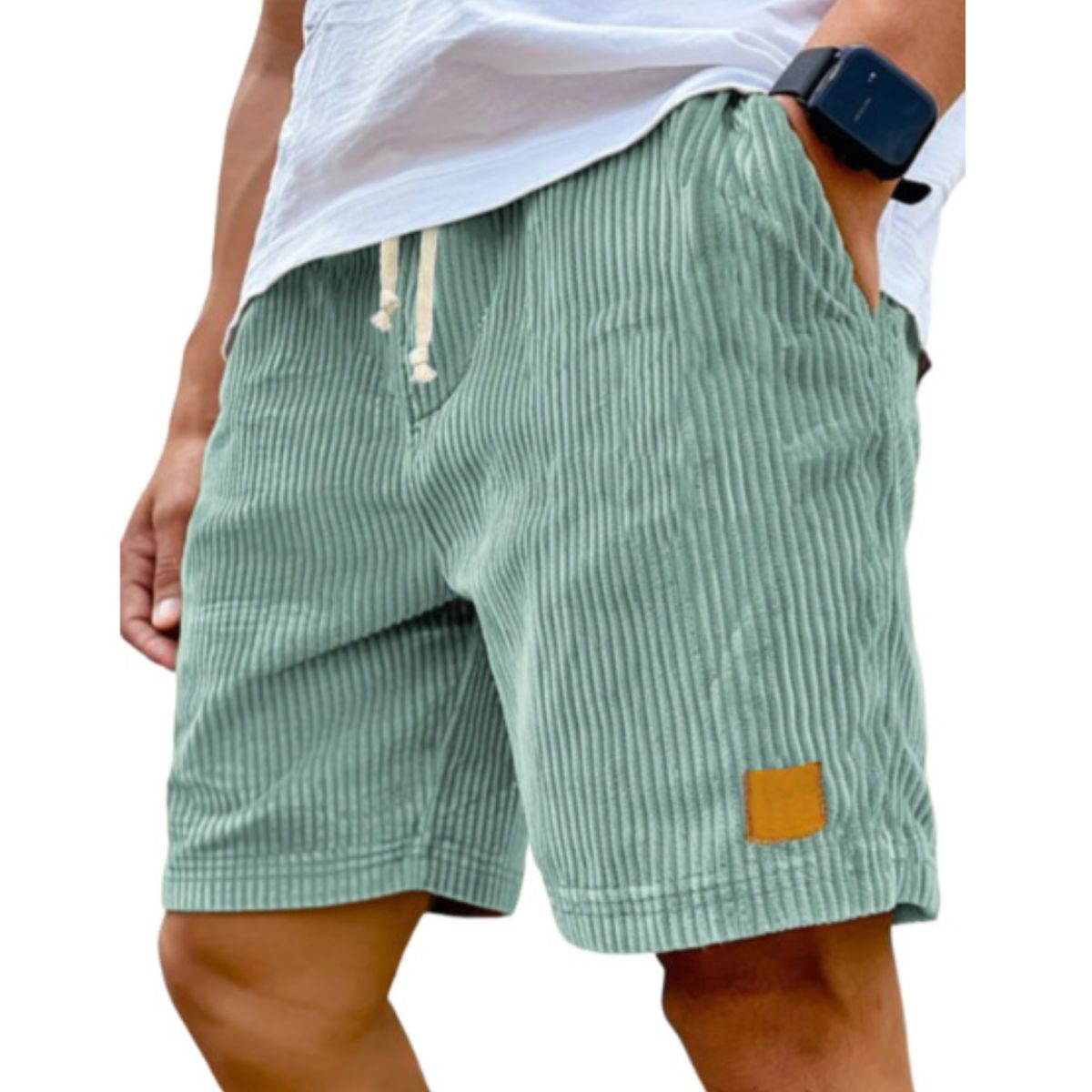 Green striped shorts worn by a person on a white background