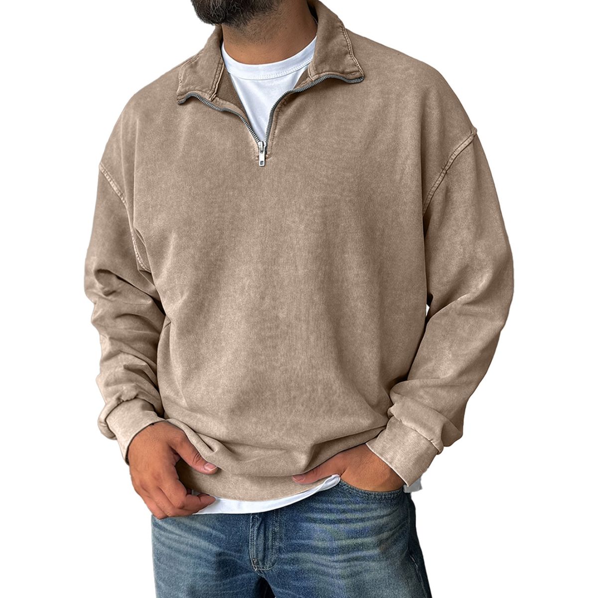Man wearing a Khaki pullover with a zipper on a white background
