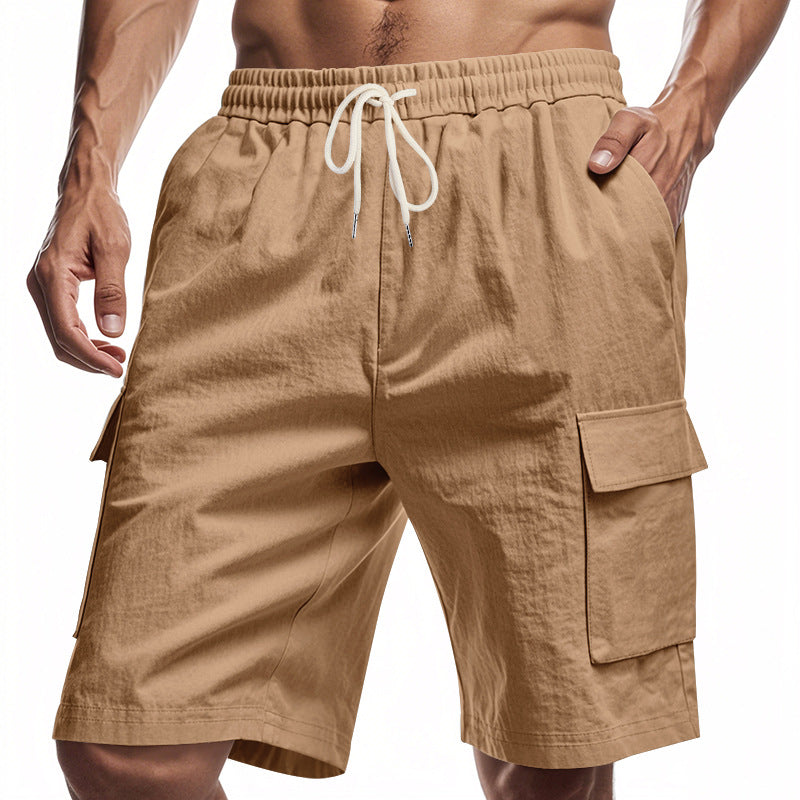 Beige cargo shorts with a drawstring on a white background