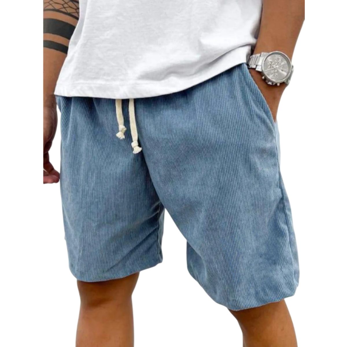 Person wearing blue shorts with a white background