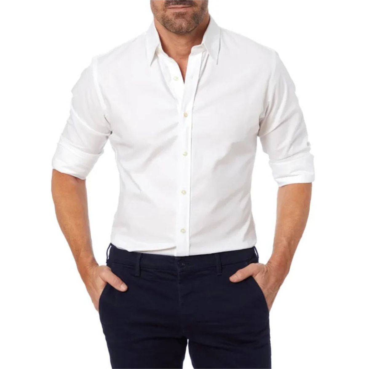 Man wearing a white dress shirt and dark pants on a white background