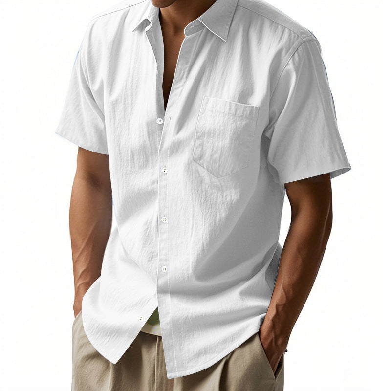White short-sleeve shirt worn by a person on a white background