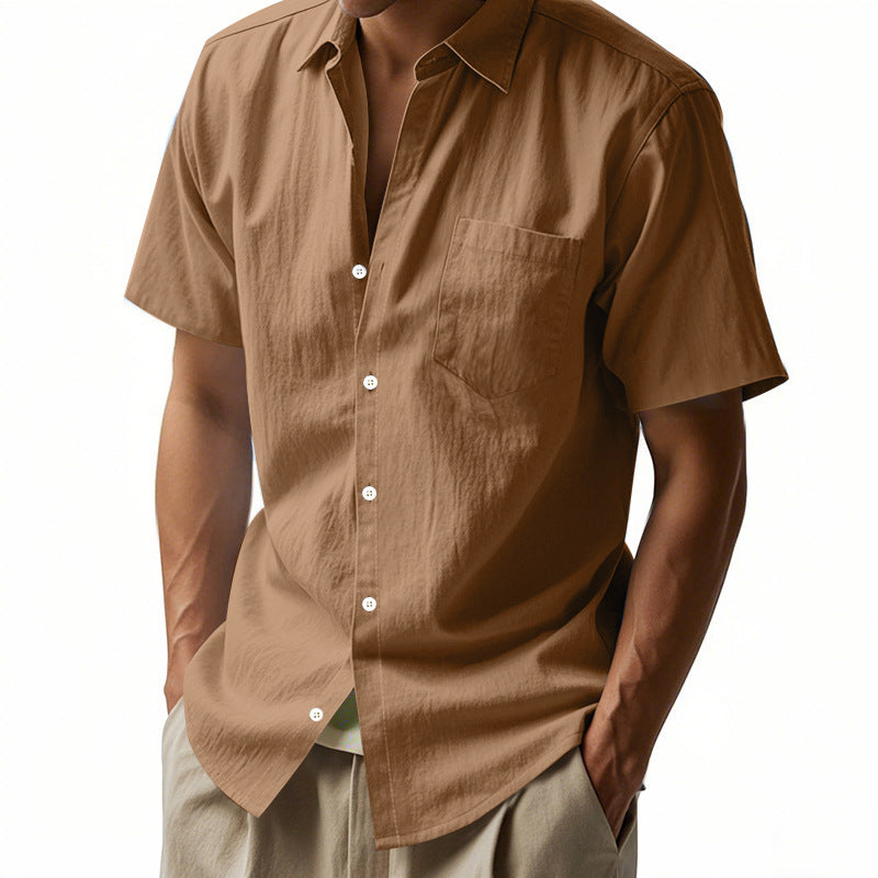 Brown short-sleeve shirt worn by a person on a white background