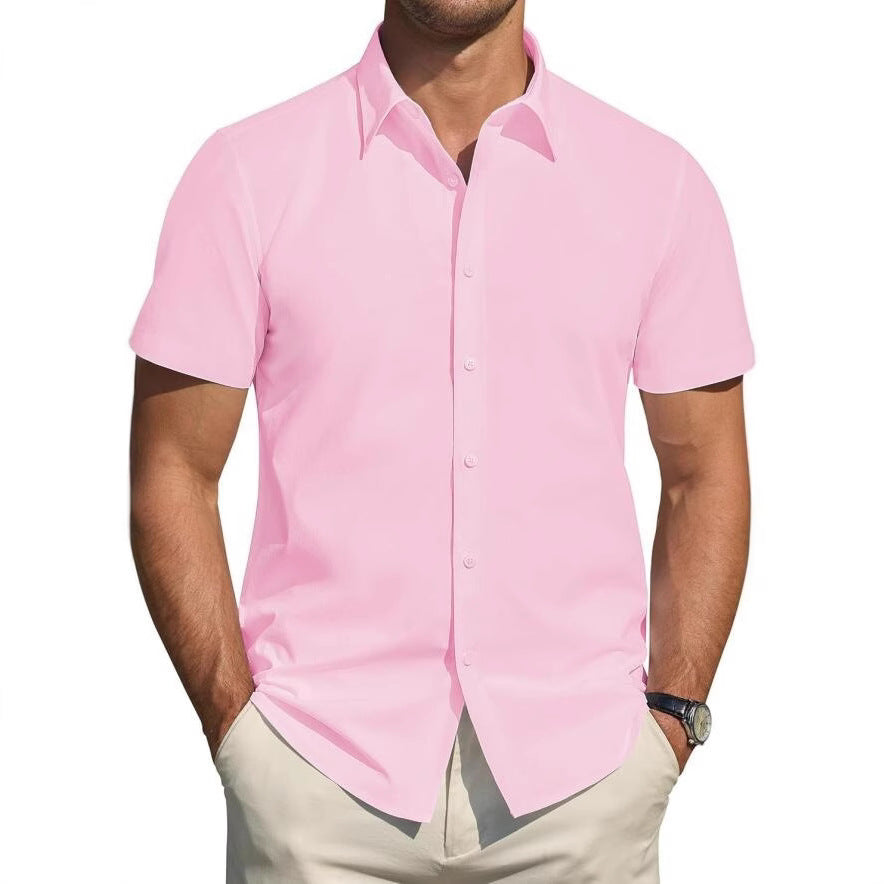 Man wearing a pink short-sleeve shirt on a white background
