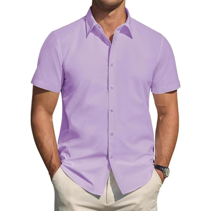 Man wearing a light purple short-sleeve shirt on a white background
