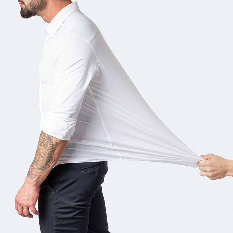 Person stretching a white shirt to demonstrate its stretchiness on a plain background