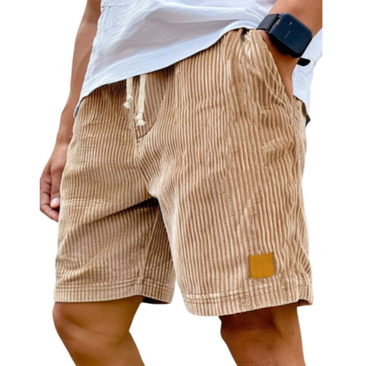 Beige striped shorts worn by a person on a white background